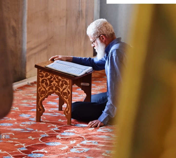 Man reading Quran