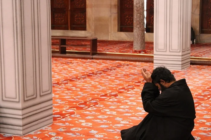 man praying in masjid ask for Allah's help